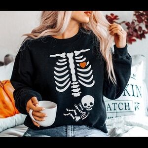 Halloween pregnancy sweatshirt.